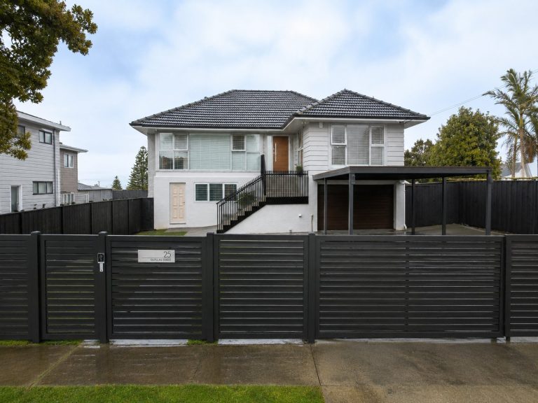 Blockhouse Bay home exterior after renovation - new aluminium gate, fence and modernised carport