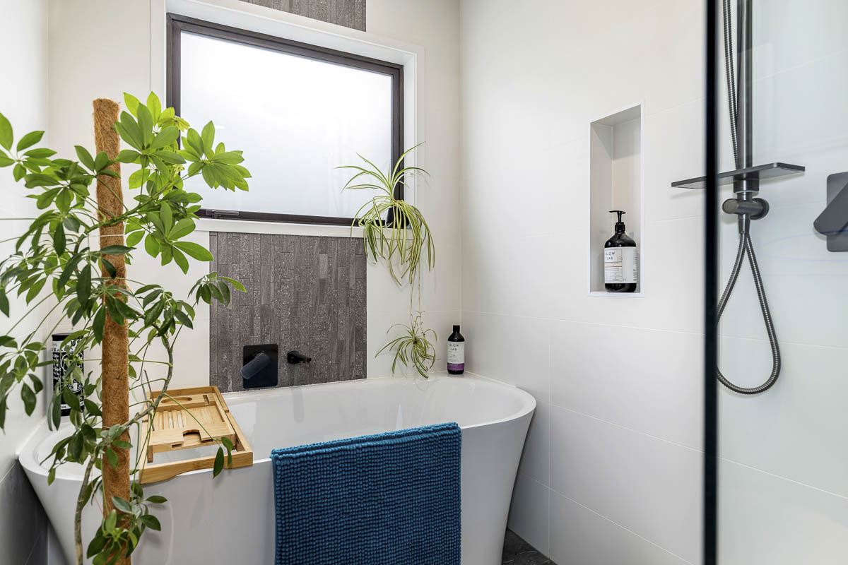 Lynfield bathroom feature wall and freestanding bath