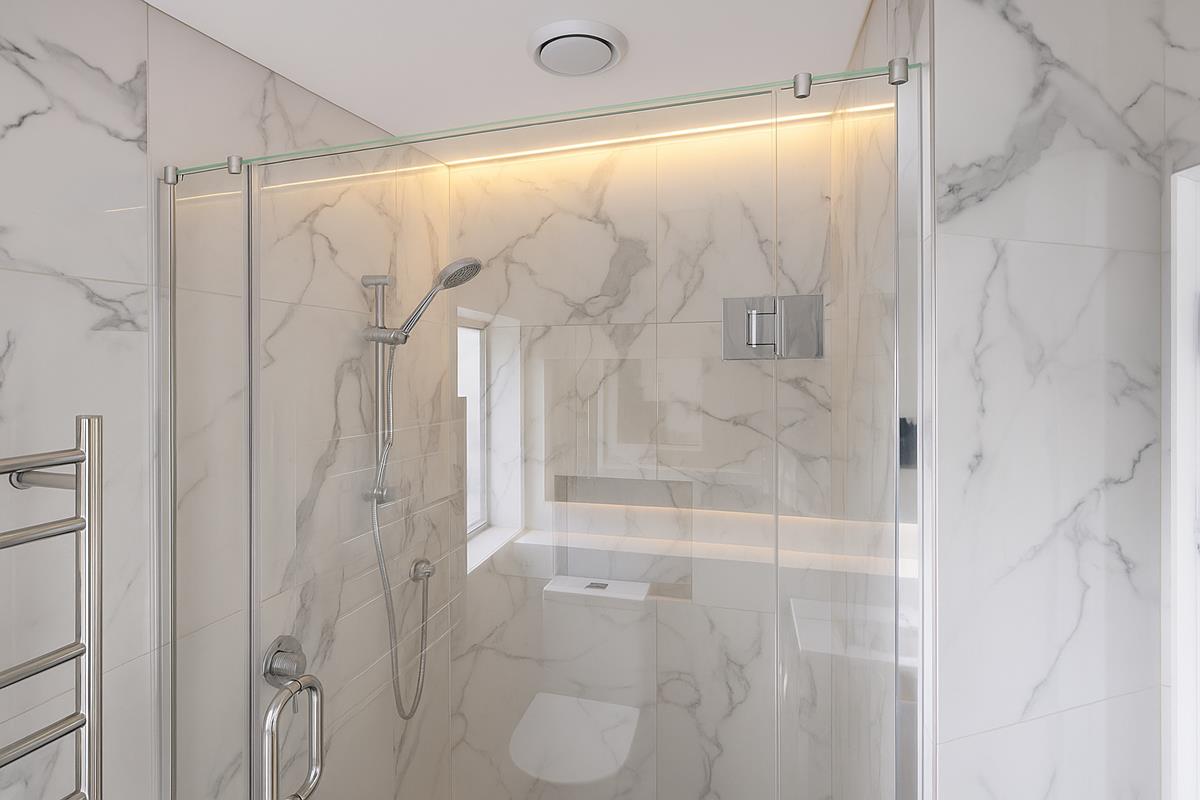 Walk-in shower with floor-to-ceiling tile &mdash; Mt Roskill renovation