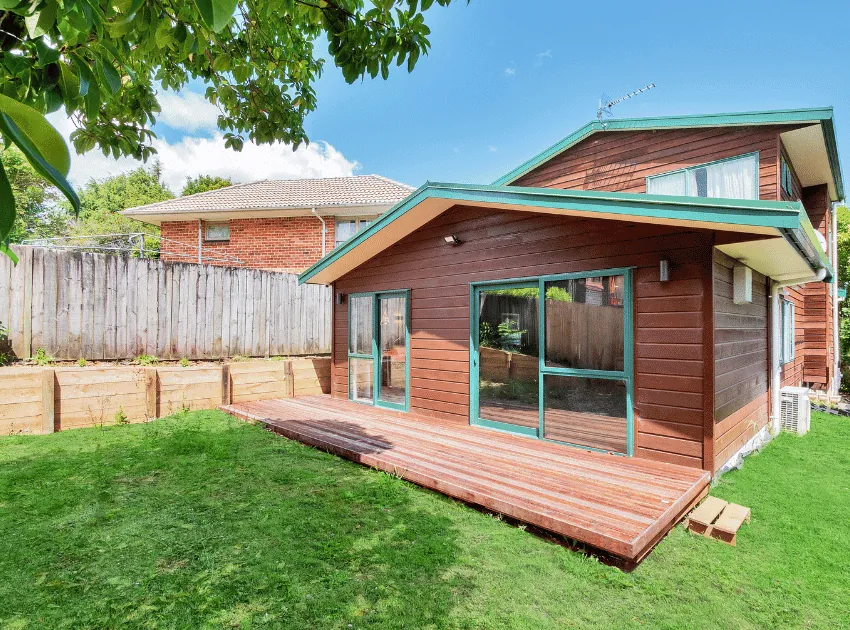 Wooden House with a lawn