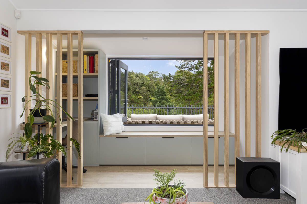 A completed Add Value Renovations interior with bespoke window seat, Auckland