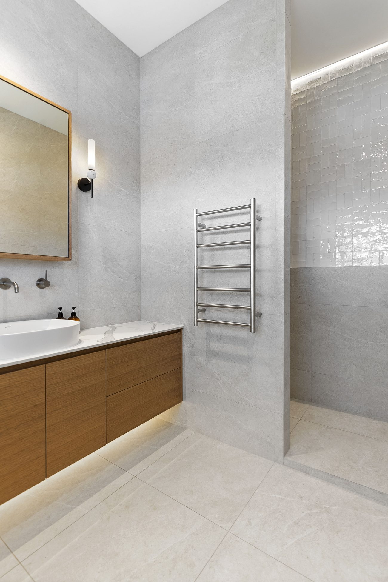 Walk-in shower entry with Fez White feature tile and concealed strip lighting — Remuera ensuite