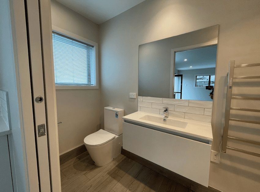 New bathroom built inside a converted Auckland garage by Add Value Renovations